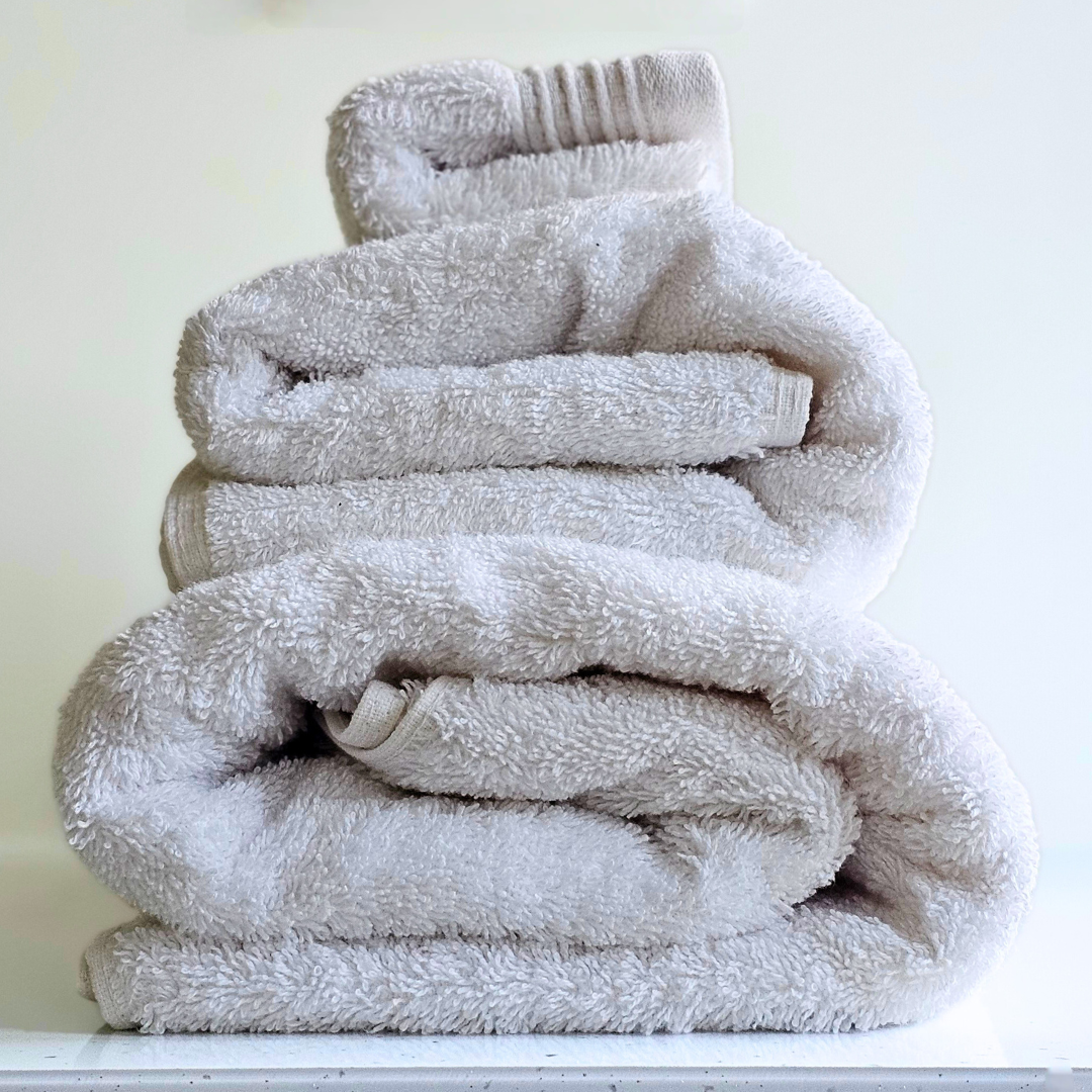 Indulge in the ultimate luxury with the Obvs at Home GOTS Certified Organic Towel Bundle. Crafted from the softest organic cotton, this collection—featuring a bath towel, hand towel, and Obvs face cloth—wraps you in pure, soothing comfort. The plush texture caresses your skin, elevating your daily ritual to an experience of serene indulgence. Eco-friendly and exquisitely soft, these towels are a true testament to sustainable luxury. Perfect for those who seek both indulgence and mindfulness in every moment.