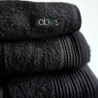 Indulge in the ultimate luxury with the Obvs at Home GOTS Certified Organic Towel Bundle. Crafted from the softest organic cotton, this collection—featuring a bath towel, hand towel, and Obvs face cloth—wraps you in pure, soothing comfort. The plush texture caresses your skin, elevating your daily ritual to an experience of serene indulgence. Eco-friendly and exquisitely soft, these towels are a true testament to sustainable luxury. Perfect for those who seek both indulgence and mindfulness in every moment.