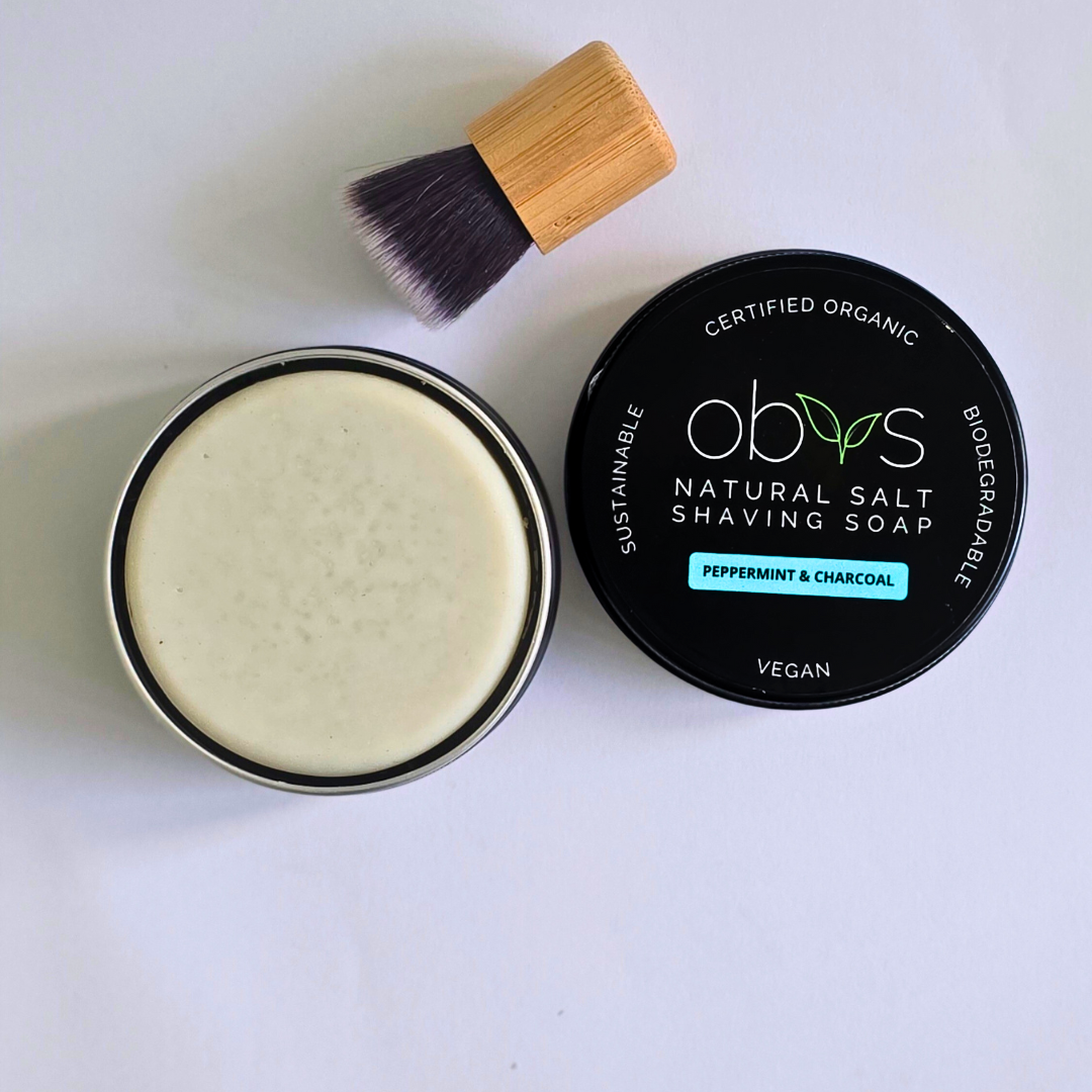 Obvs Skincare New Shaving Soap Travel Kit with peppermint and charcoal shaving soap in travel tin and mini shaving brush