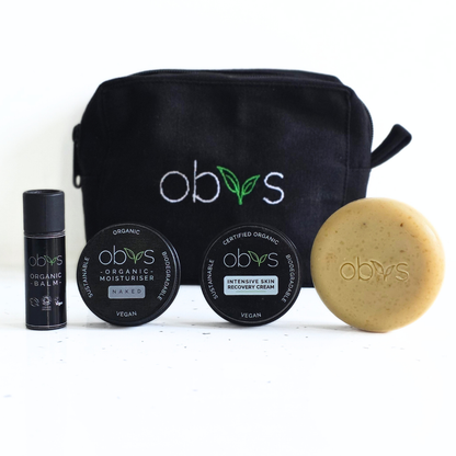 Essential Obvs Skincare Gift Set including Intensive Skin Recovery Cream, Naked Organic Moisturiser, Organic Balm, Organic Oat Soap and Organic Toiletry Bag. Natural vegan skincare for dry sensitive or acne prone skin.