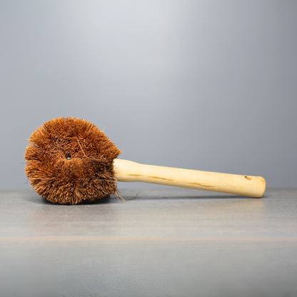 Meet the eco-friendly Pot & Pan Brush, crafted with durable, natural coconut fibers and a sturdy wooden handle for an effective, non-scratch clean. Measuring 21cm by 7.5cm, this thoughtfully designed brush is gentle on cookware but tough on grime, making it the perfect sustainable choice for everyday cleaning.