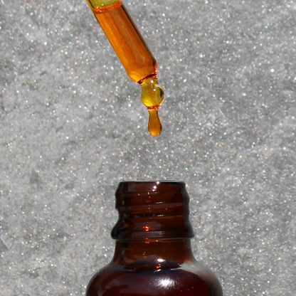 organic rosehip oil bottle with amber hue rich in essential fatty acids vitamins A C and E for anti aging hydration and skin repair