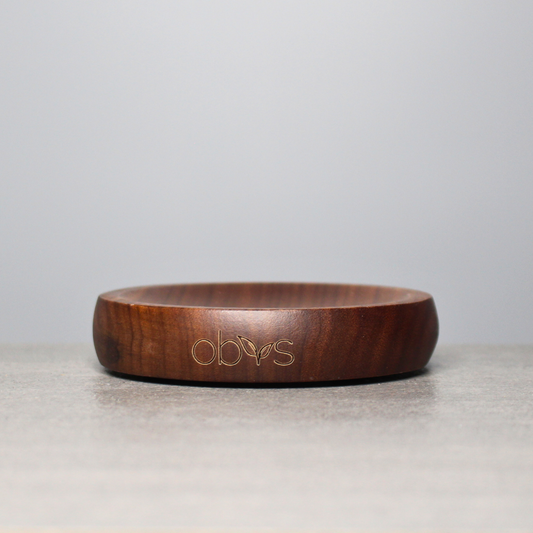 Introducing the Obvs Skincare Handcrafted Walnut Soap Dish - a blend of elegance and sustainability for your bathroom. Crafted from premium, eco-friendly walnut wood